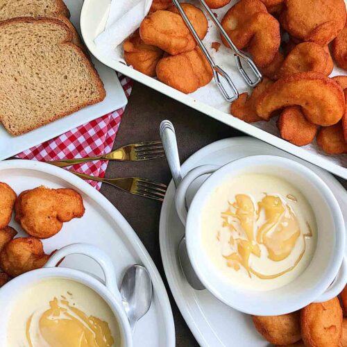 Custard or Akamu (pap) with 4 slice of fresh bread and 10 akara, 1 tin milk, brown sugar or honey