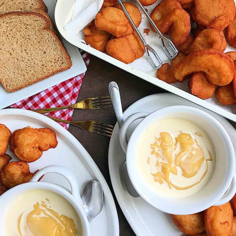 Custard or Akamu (pap) with 4 slice of fresh bread and 10 akara, 1 tin milk, brown sugar or honey
