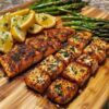 Salmon steak with asparagus and assorted vegetables
