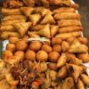 Small chops (spring rolls, samosa, beef kebab, chicken drumsticks, puff puff, moneybags)