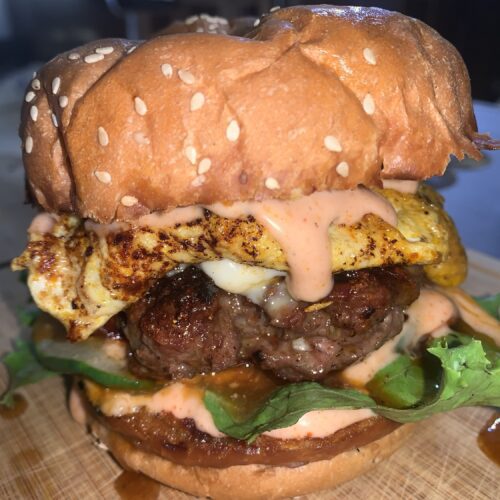 Japanese honey ginger chicken burger with Japanese mayonnaise and fried sweet potatoes