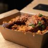 Smokey Nigerian jollof with chicken and plantains