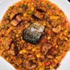 Porridge beans with fried yam or plantain with Titus fish