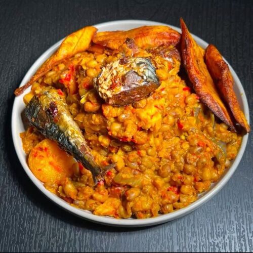 Porridge beans with fried yam or plantain with Titus fish