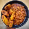 Porridge beans with fried yam or plantain with Titus fish