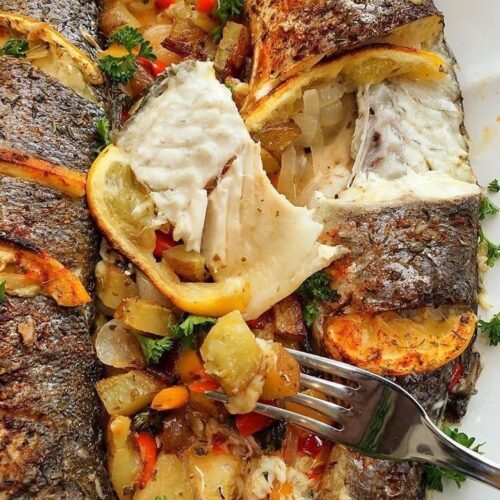 Special barbecue fish with grilled veggies and fries