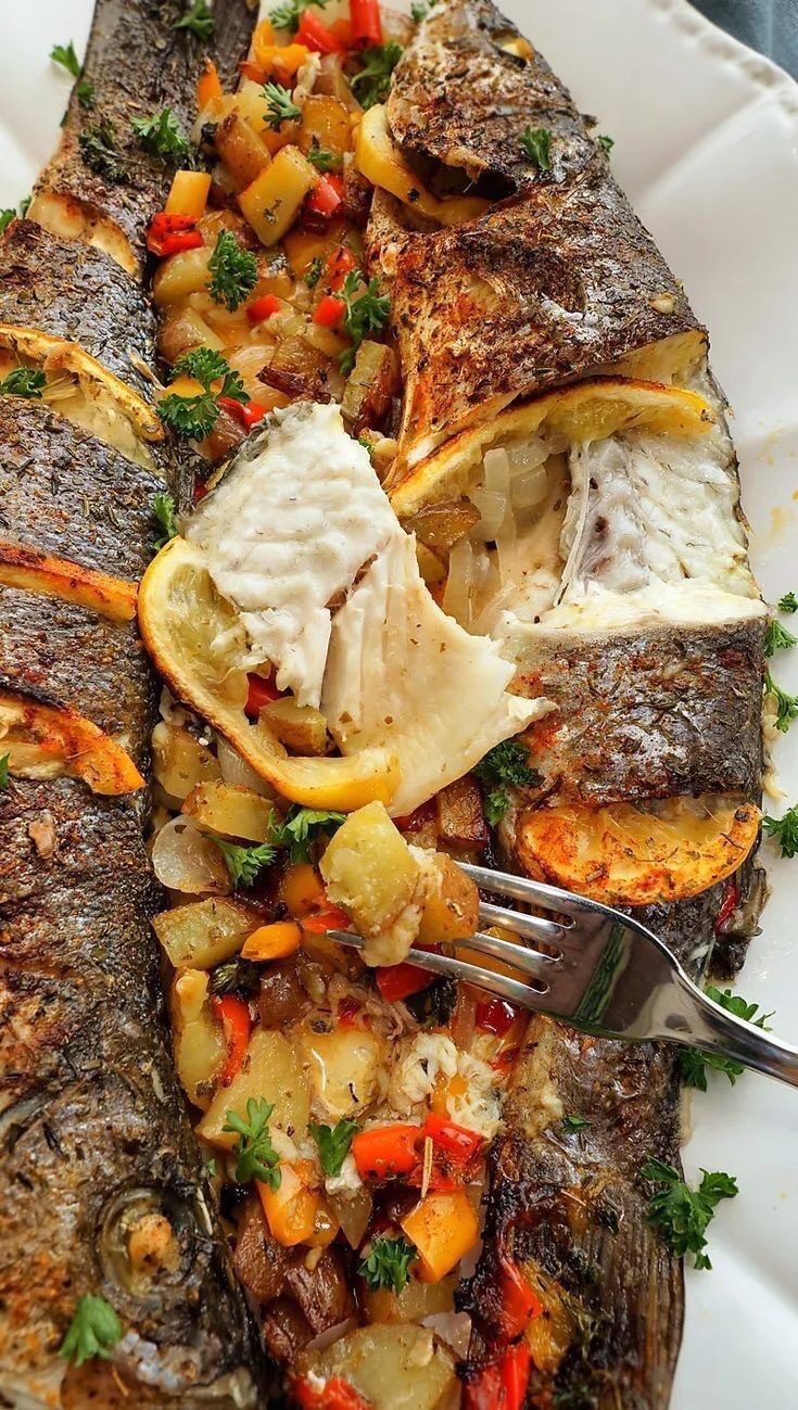 Special barbecue fish with grilled veggies and fries