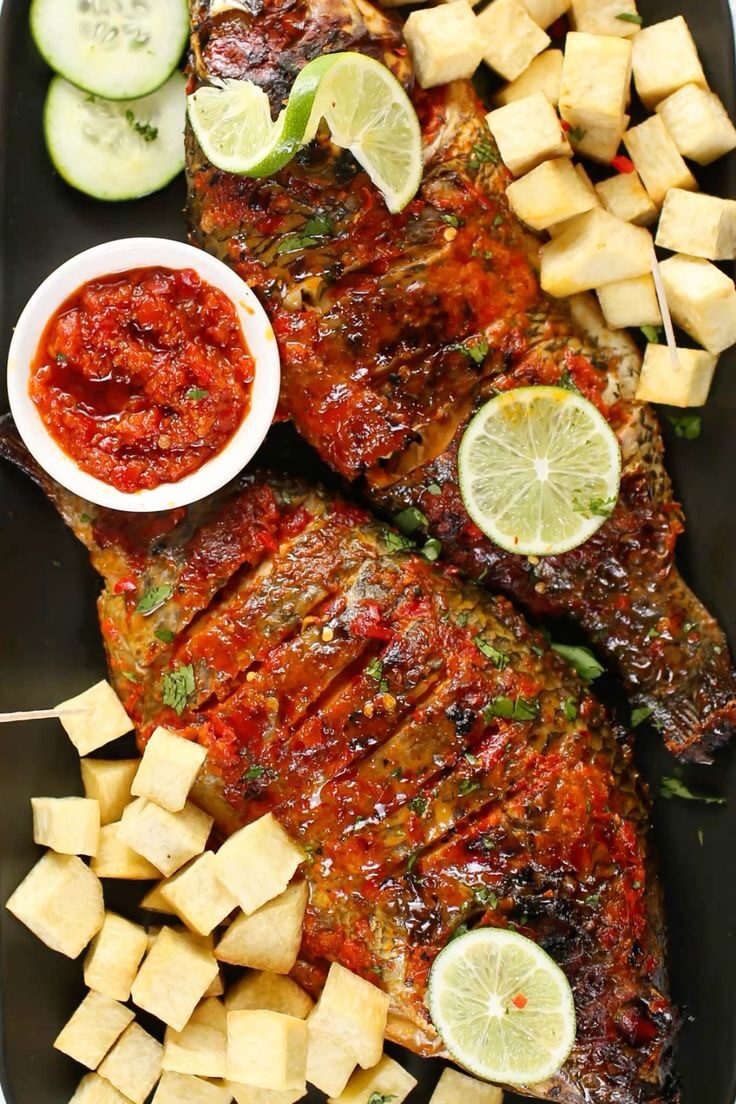 Special barbecue fish with grilled veggies and fries